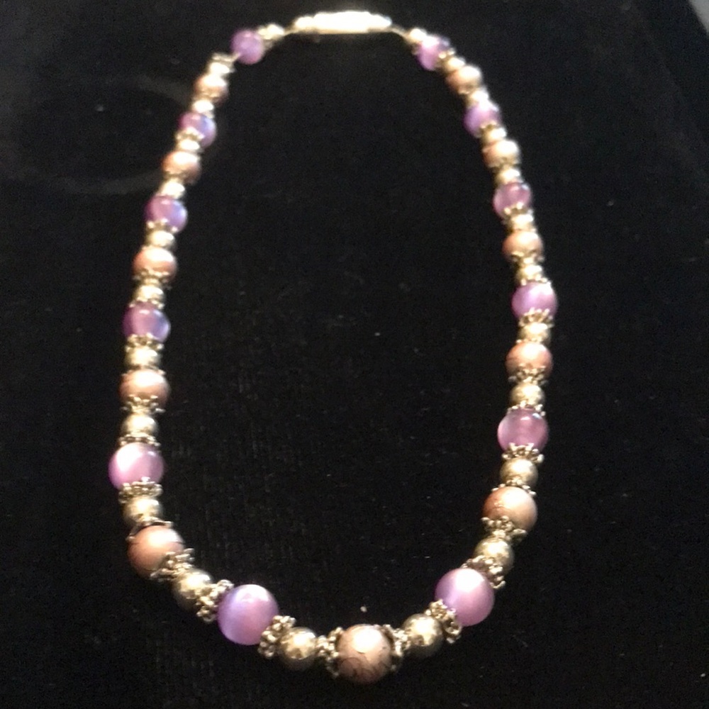 Magnetic closure strong silver tone  pink and purple necklace .